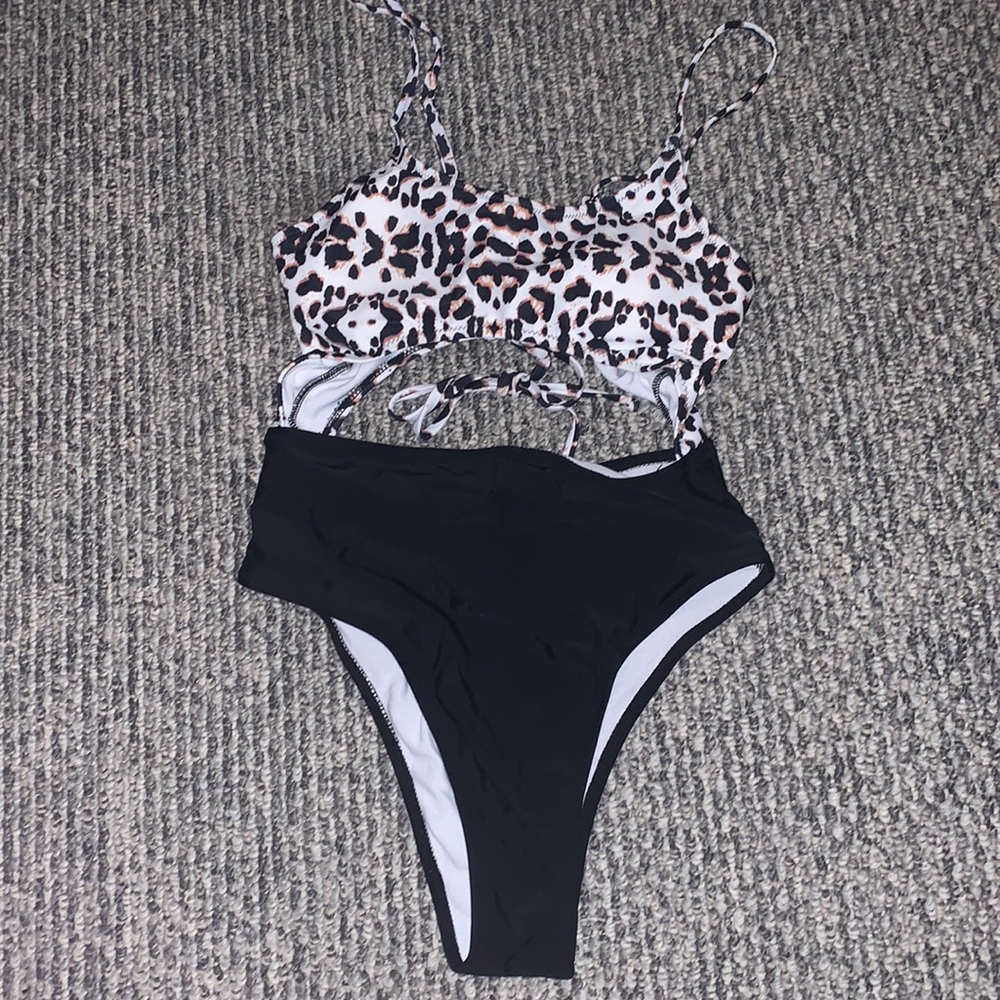 Cheetah and black cut out one piece bathing suit